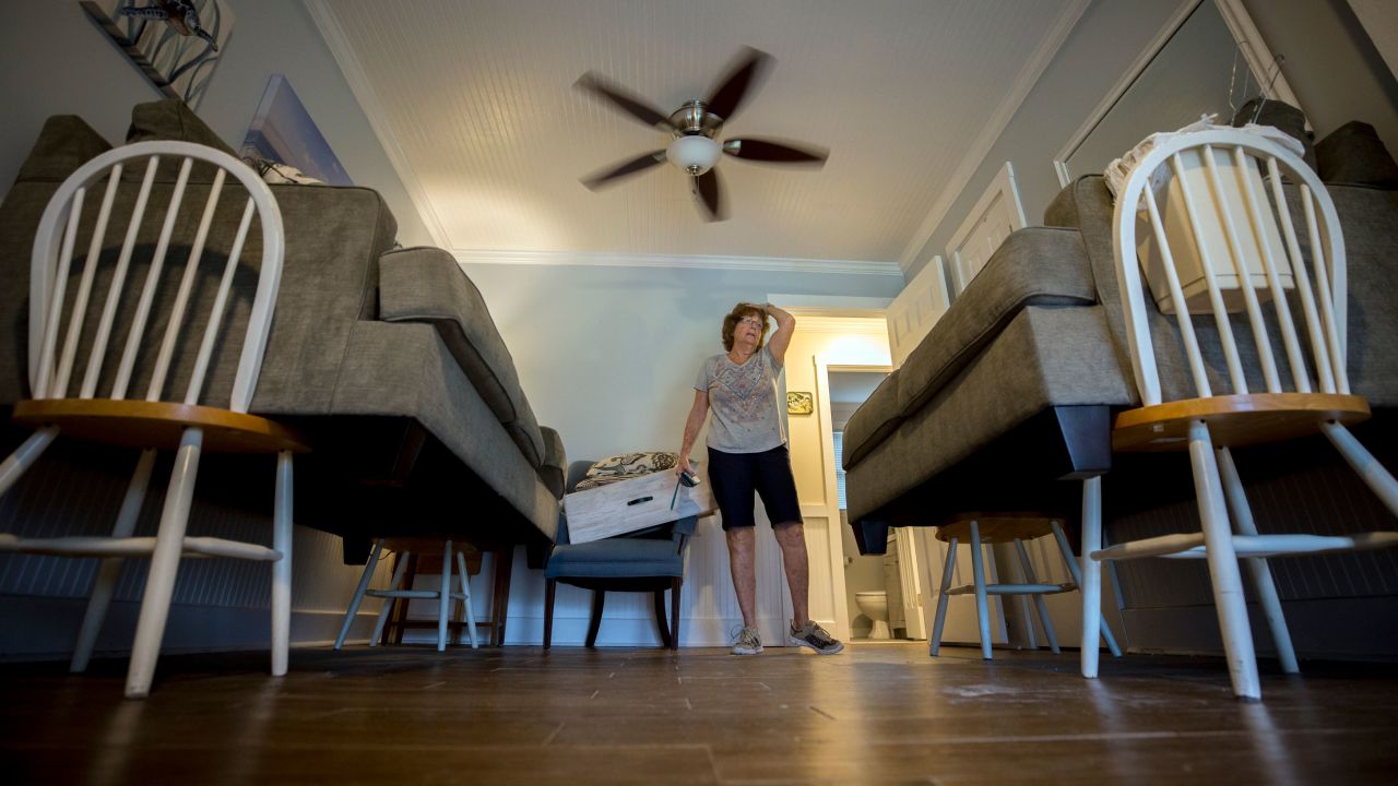Debbie Pagan checks her raised furniture one last time before she and her husband evacuated their home in Tybee Island, Georgia, on September 4.