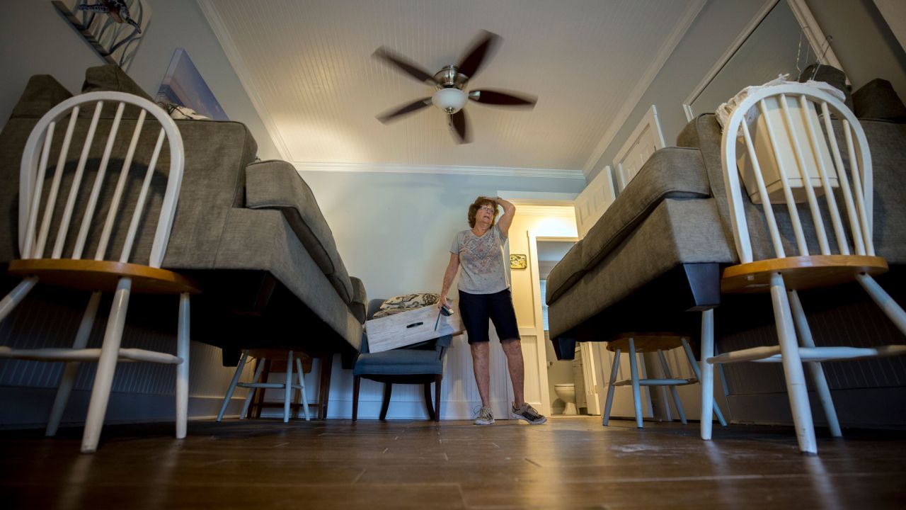 Debbie Pagan checks her raised furniture one last time before she and her husband evacuated their home in Tybee Island, Georgia, on September 4.