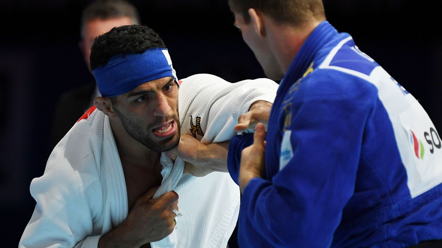 Mollaei fights against Matthias Casse during the semifinal of judo's World Championships.