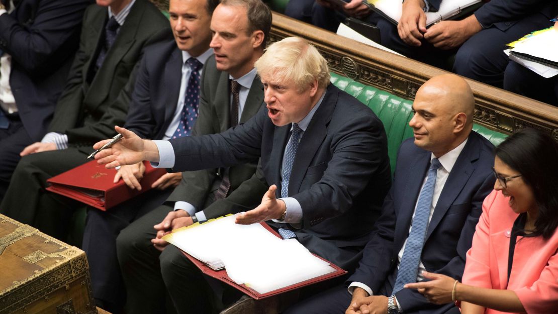 Boris Johnson reacts to Jeremy Corbyn during his first Prime Minister's Questions Wednesday.