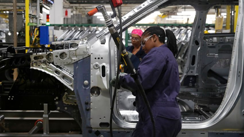 Workers assemble cars at the newly renovated Ford's Assembly Plant in Chicago, June 24, 2019. - The plant was revamped to build the Ford Explorer, Police Interceptor Utility and Lincoln Aviator. (Photo by JIM YOUNG / AFP)        (Photo credit should read JIM YOUNG/AFP/Getty Images)