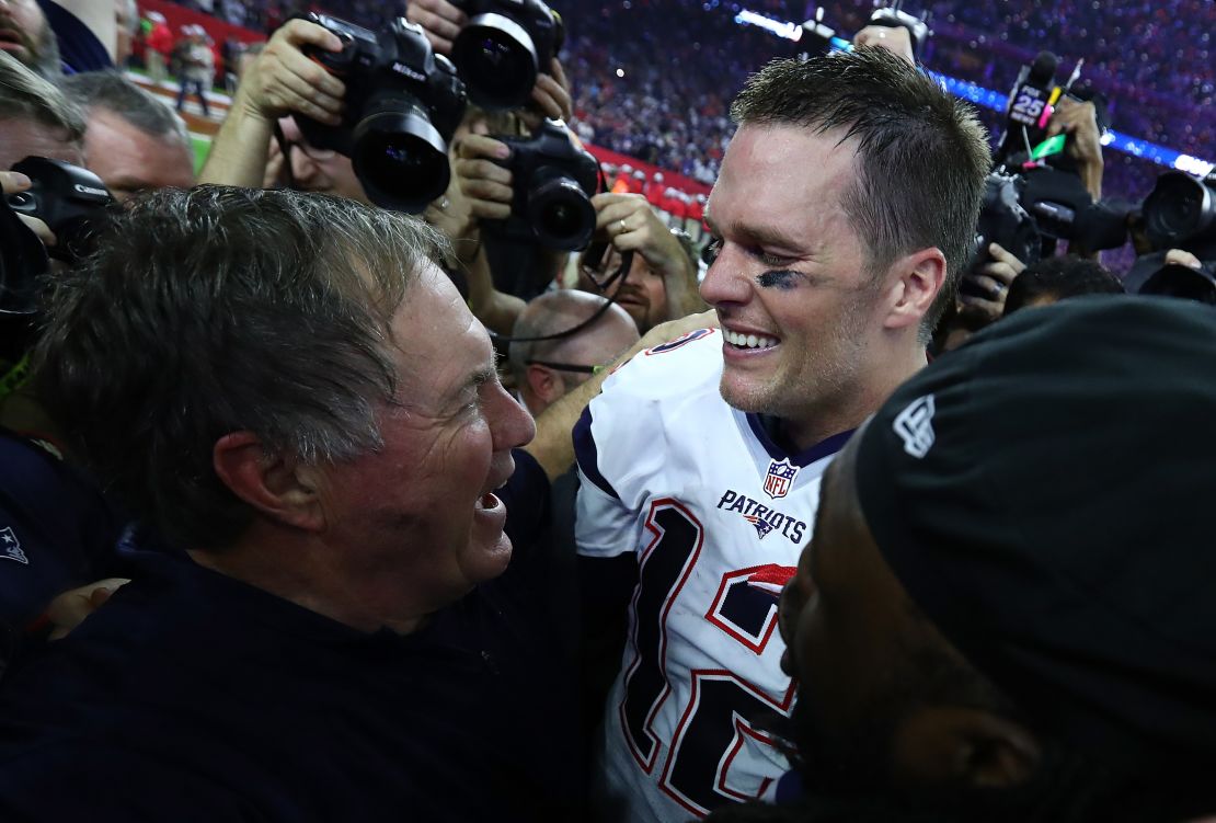 Brady and Belichick celebrate the Patriots' 34-28 overtime win against the Atlanta Falcons during Super Bowl LI.