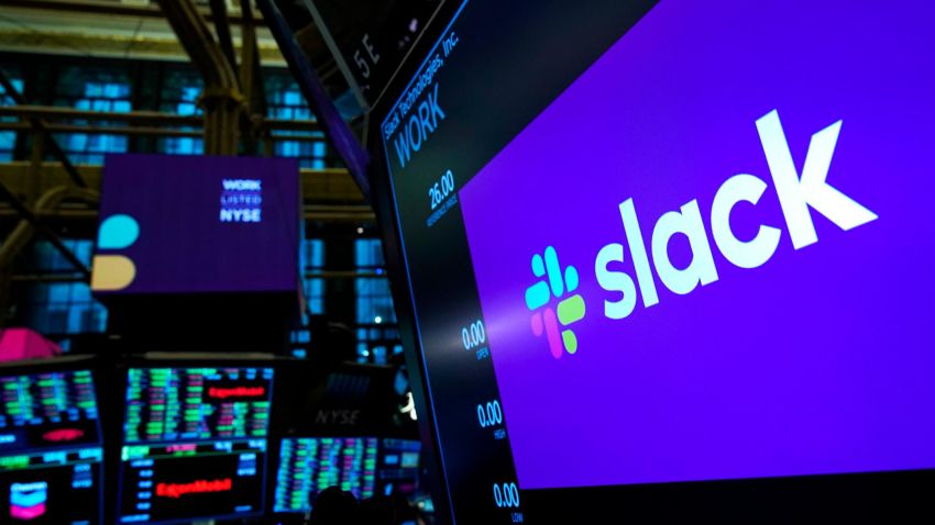 NEW YORK, NY - JUNE 20: The logo for Slack is displayed on a trading post monitor at the New York Stock Exchange (NYSE), June 20, 2019 in New York City. The workplace messaging app Slack will list on the New York Stock Exchange this morning. Shares of Slack were surging more than 60 percent over its reference price in early afternoon trading. (Photo by Drew Angerer/Getty Images)