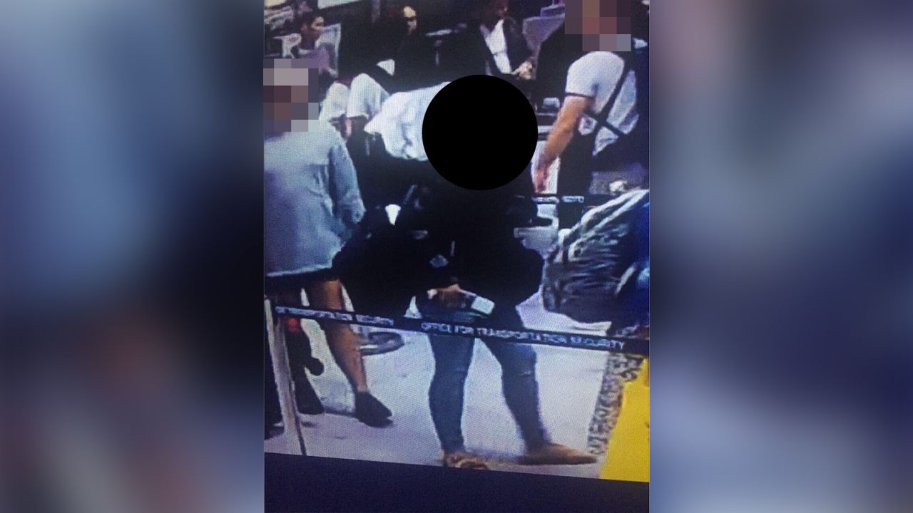 CCTV still released by the Philippines Immigration Bureau of the American woman before she was stopped by officials.