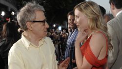 Woody Allen, left, writer/director of "Vicky Cristina Barcelona," chats with cast member Scarlett Johansson on the red carpet at the premiere of the film in Los Angeles, Monday, Aug. 4, 2008. (AP Photo/Chris Pizzello)