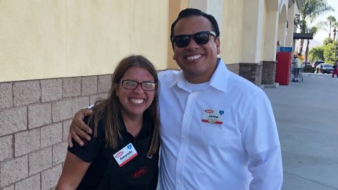 Jaime Escarcega (right), a Ralphs cashier in Riverside, California, has worked at the chain for 14 years.