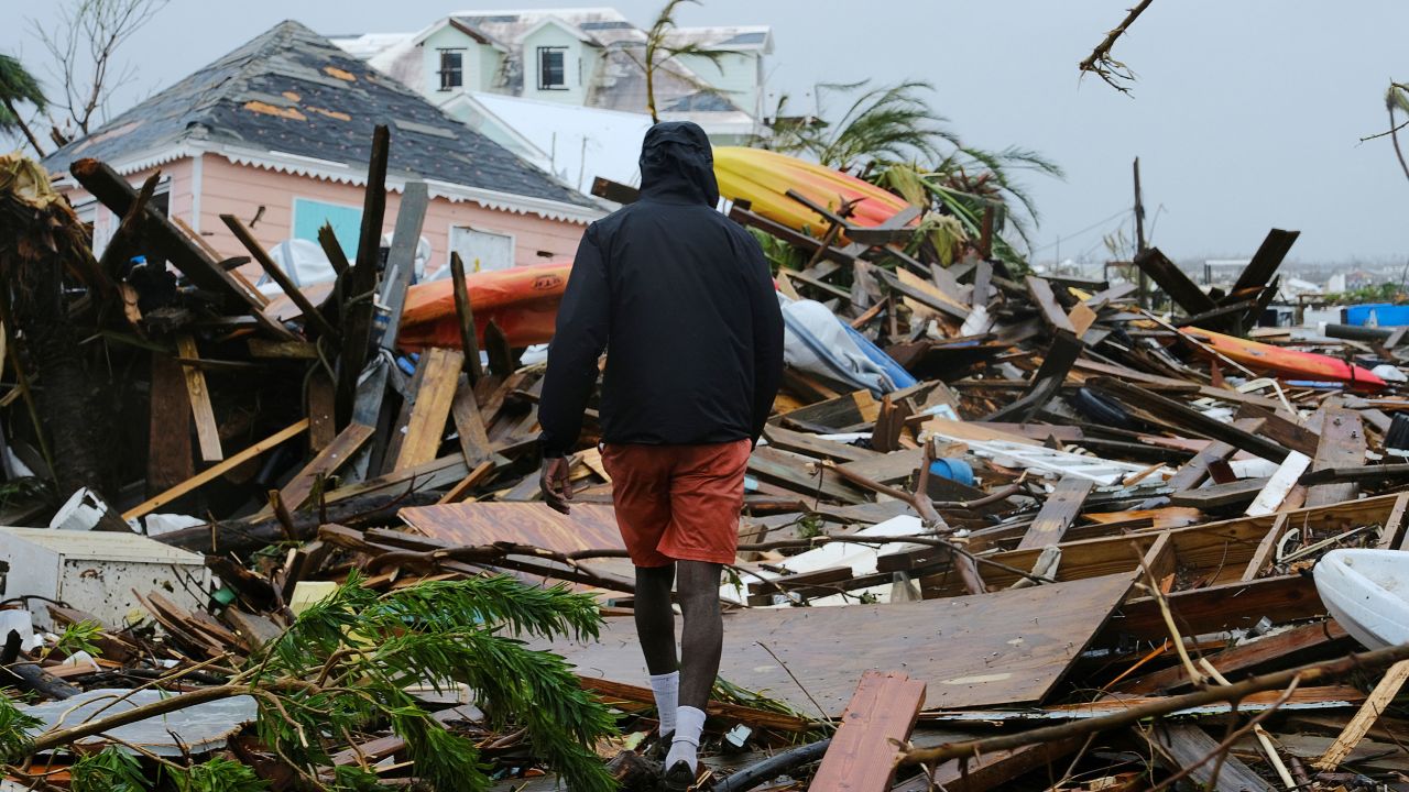 A man walks through the rubble left by Hurricane Dorian in Marsh Harbour, Bahamas, on September 2.
