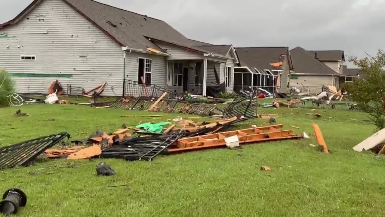Pieces of roofs and siding were torn off homes Thursday morning in Carolina Shores, North Carolina, about 40 miles southwest of Wilmington.