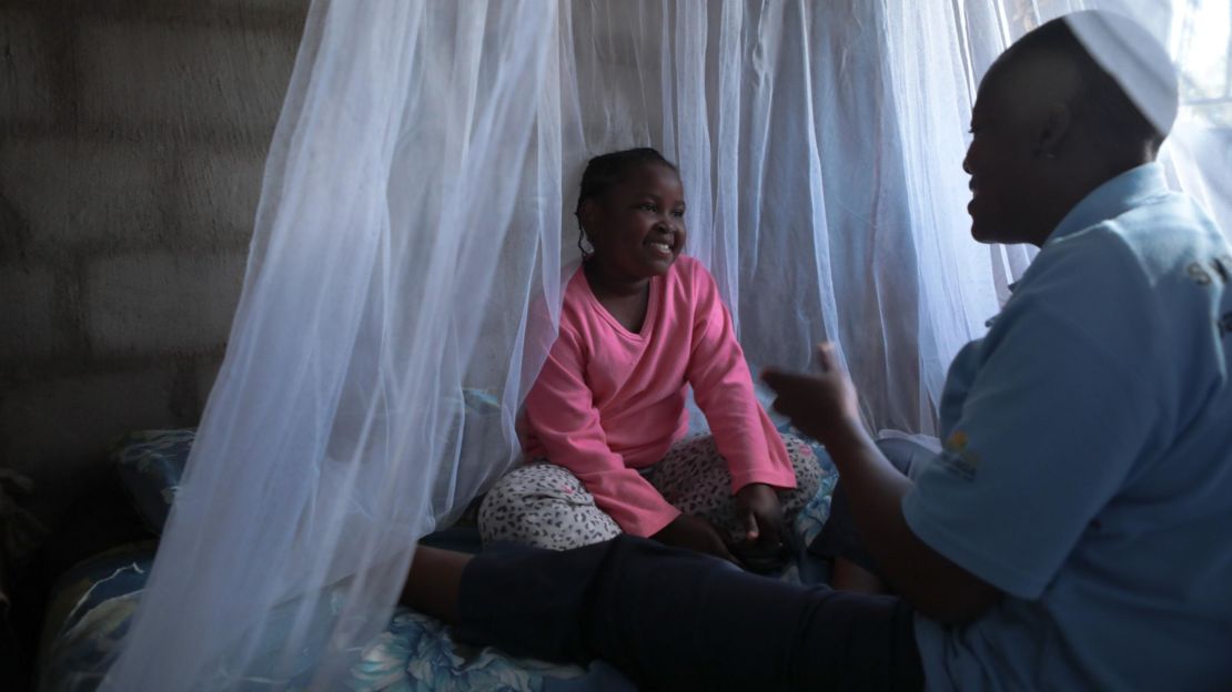 Sitting under a newly hung bednet in Mpumalanga province, South Africa