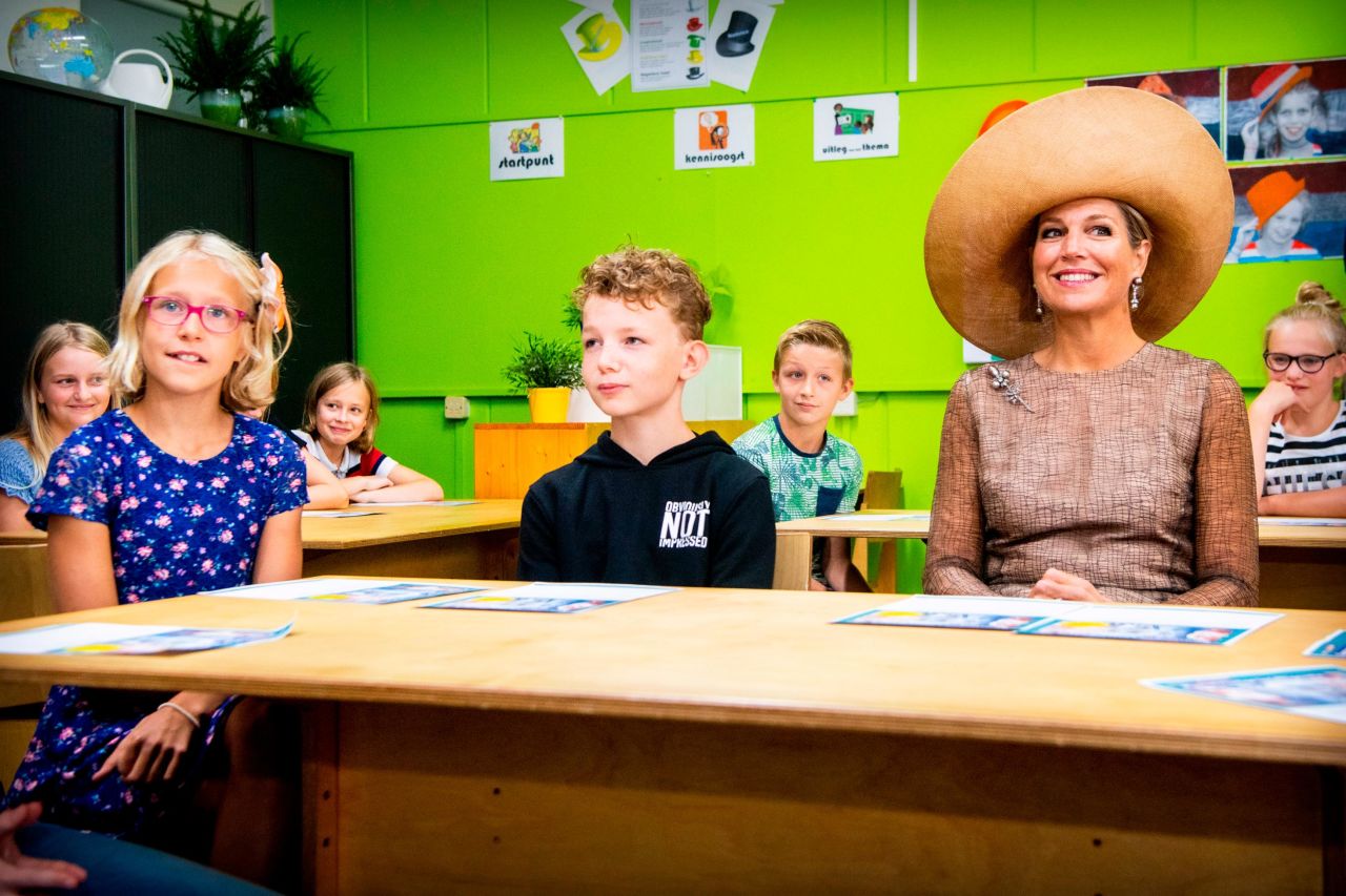 Queen Maxima of the Netherlands sits with students during the launch of the National AI Junior course in Toldijk, the Netherlands, on Wednesday, September 4. The course aims to teach children the principles of artificial intelligence.