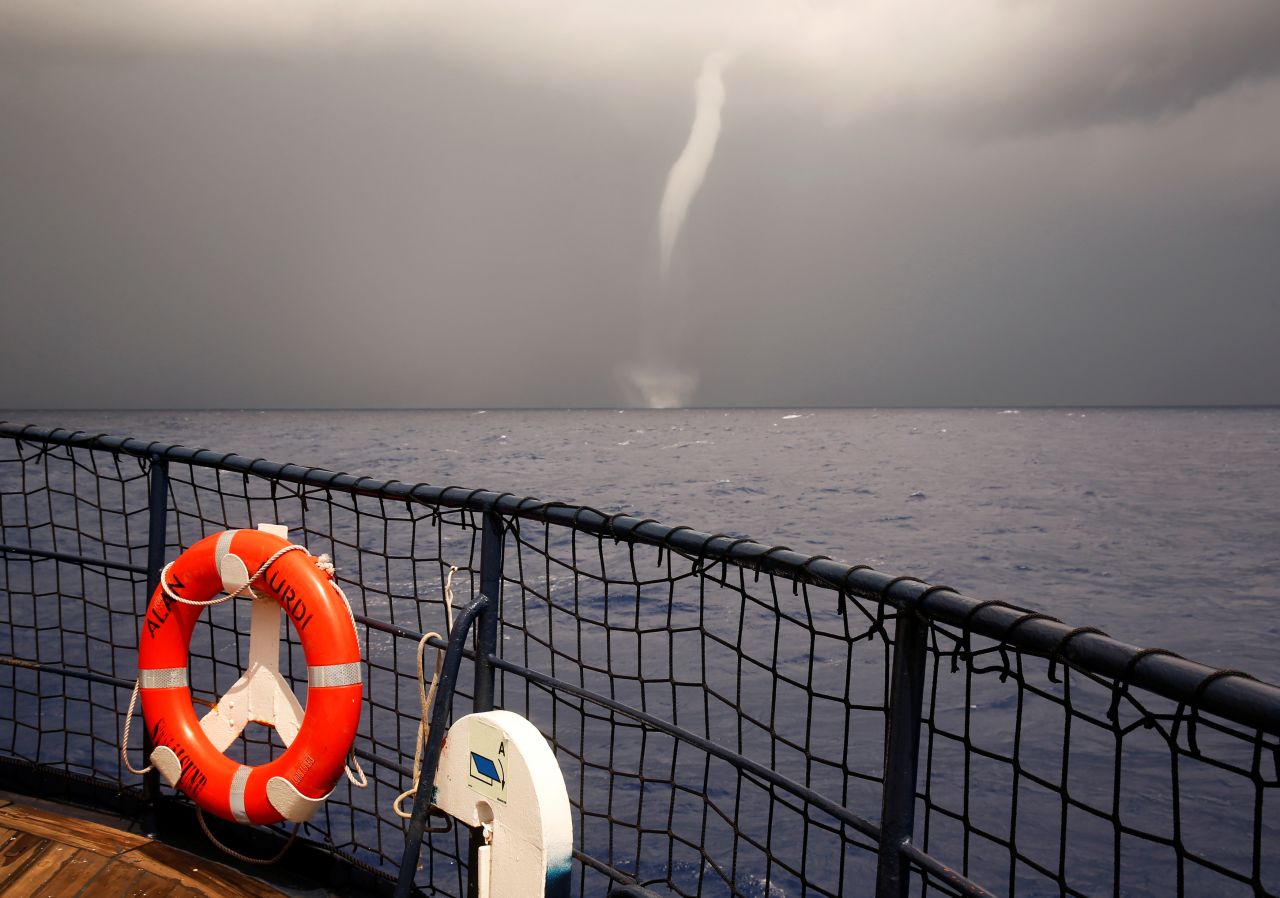 A waterspout is seen from the German NGO Sea-Eye migrant rescue ship "Alan Kurdi as its crew awaits further instructions after rescuing Tunisian migrants in international waters off Malta in the central Mediterranean Sea on Wednesday, September 4.