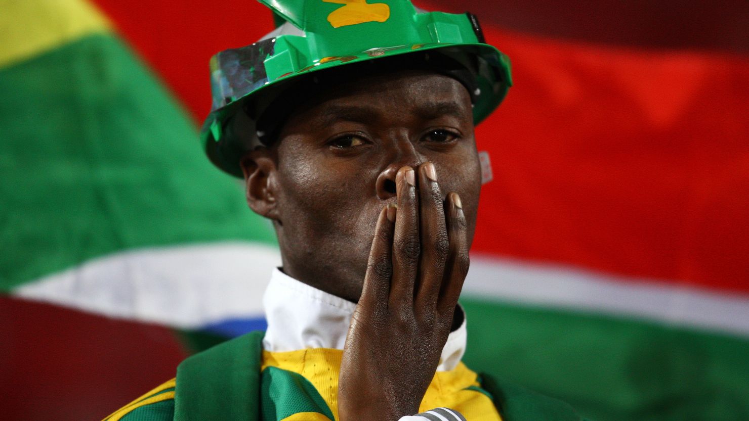 A South African fan watches as his team lose to Brazil in 2009. 