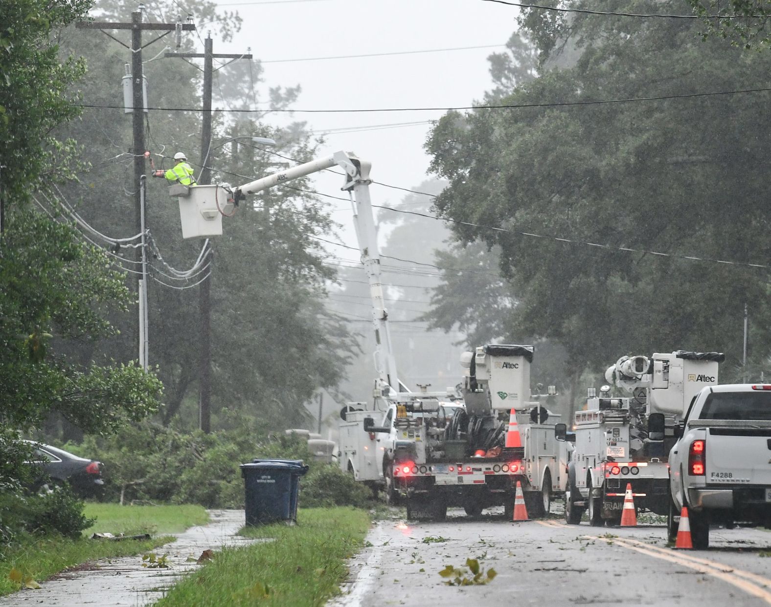 Utility crews work on restoring power in Myrtle Beach, South Carolina, on September 5.