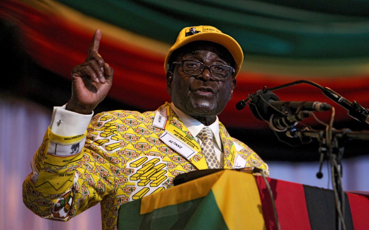 Mugabe delivers a speech at his party's annual national conference in December 2012. He vowed to overhaul business laws to require 100% black ownership of firms.