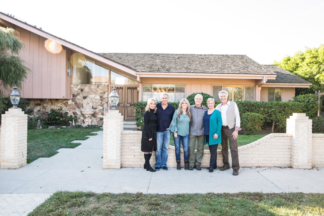 Maureen McCormick, Christopher Knight, Susan Olsen, Mike Lookinland, Eve Plumb and Barry Williams in front of the original Brady home in Studio City, CA, as seen on 'A Very Brady Renovation.'