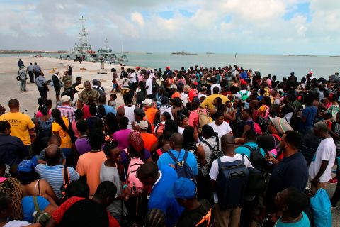 Evacuees wait to leave Marsh Harbour in the Bahamas.