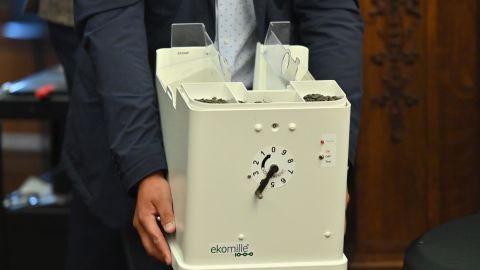 An 'Ekomille' rat trap is displayed at Thursday's press conference.
