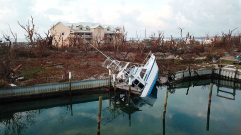 A boat sits turned on its side in the aftermath of Hurricane Dorian, in Marsh Harbor, Abaco Island.