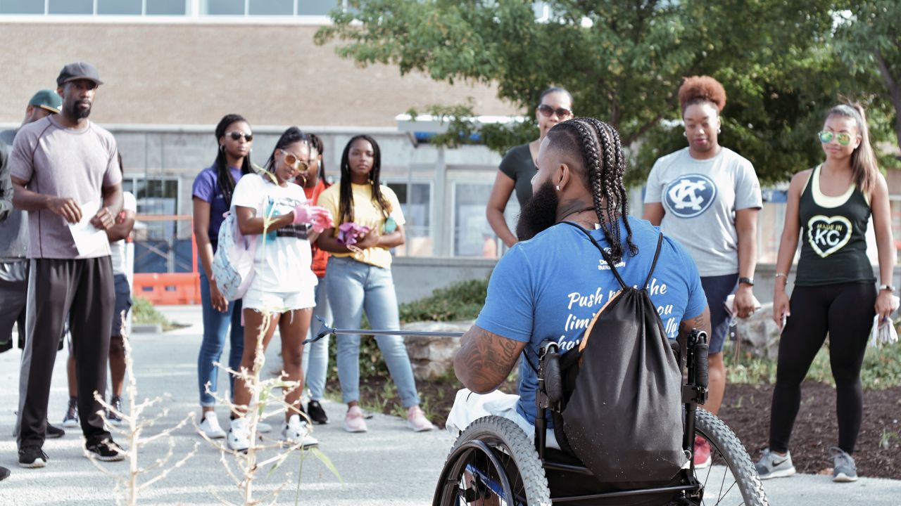 Wesley Hamilton leads members of Change KC at a cleanup event in 2018.