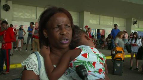Ceva Seymour, 57, describes how her roof began to lift in the winds.