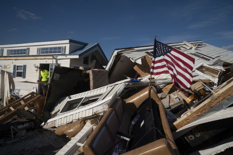 A man surveys damage at the Boardwalk RV Park in Emerald Isle, North Carolina, on Friday, September 6.