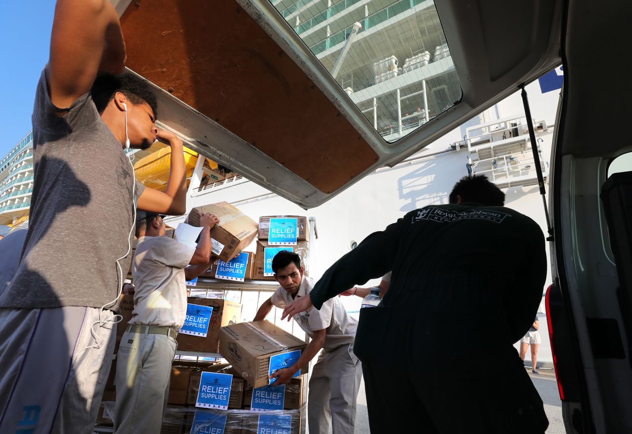 Boxes of food are loaded onto trucks in Freeport, Bahamas, on September 7.