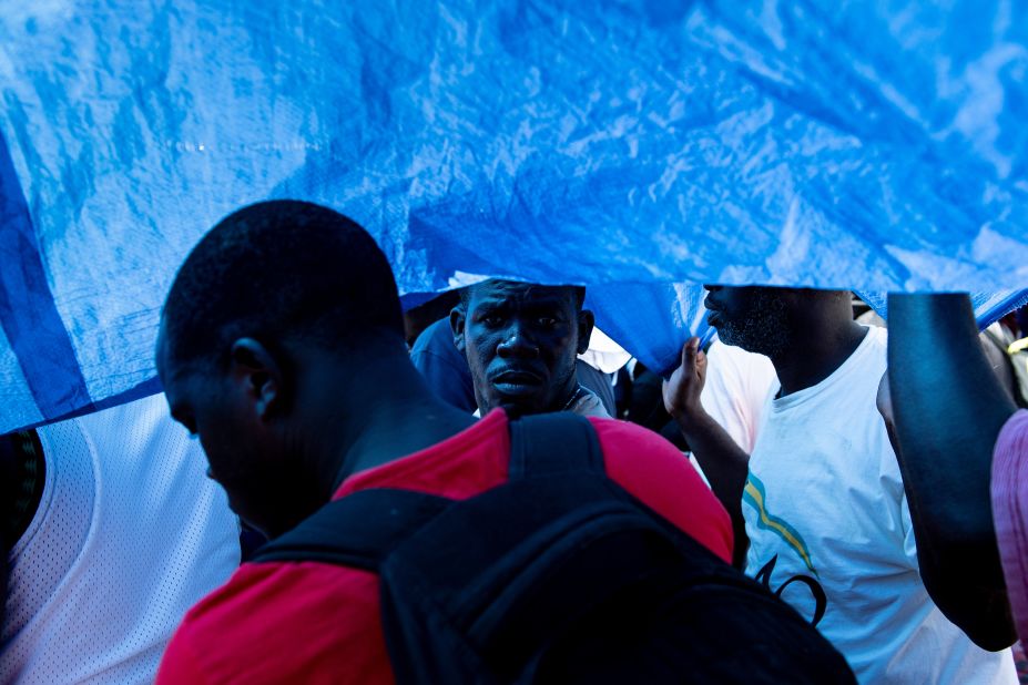 People wait to leave Marsh Harbour on September 7.