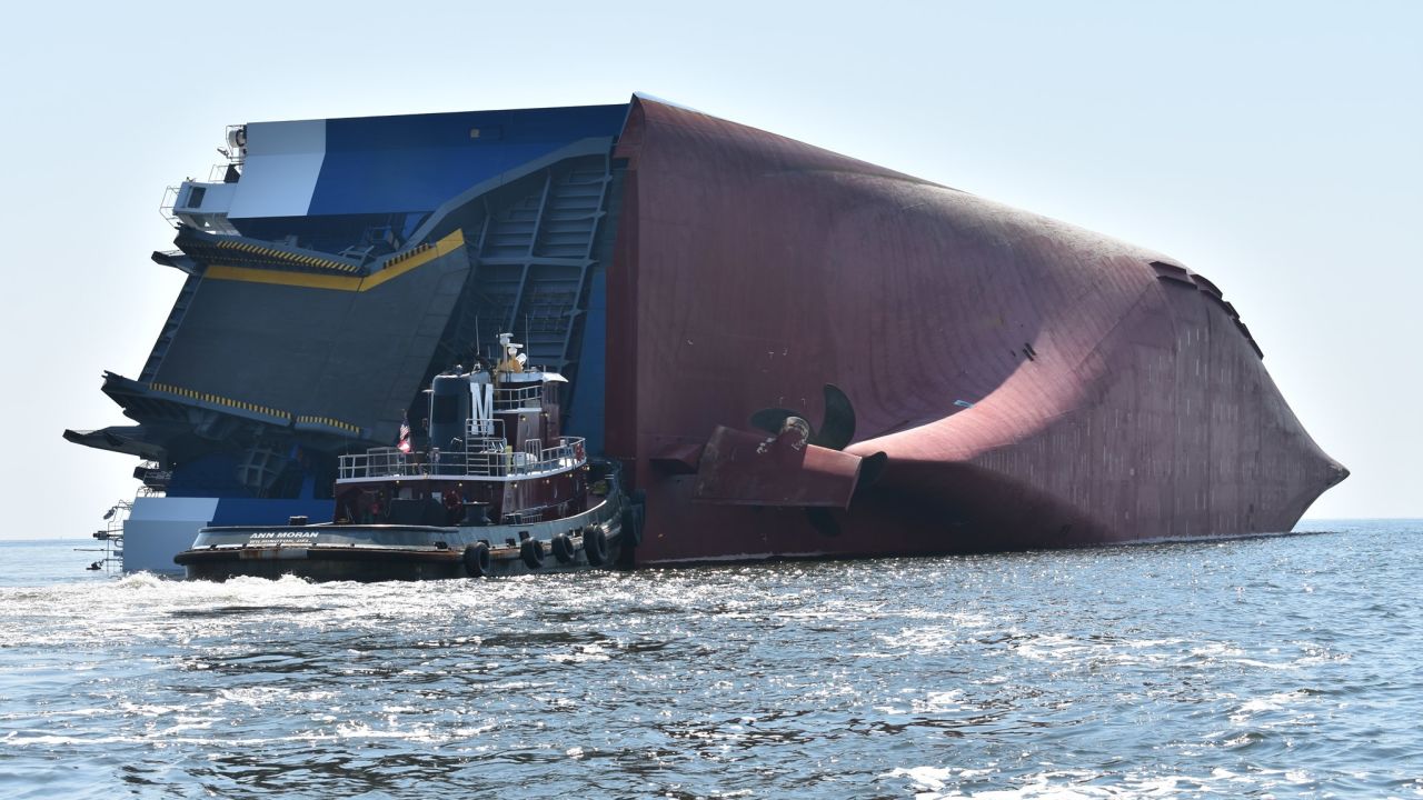 The Golden Ray lies on its side in St. Simons Sound on Sunday.