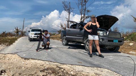CNN producer Jaide Timm- Garcia and photojournalist Jose Armijo set up for a liveshot from the hard-hit town of High Rock on Grand Bahama.