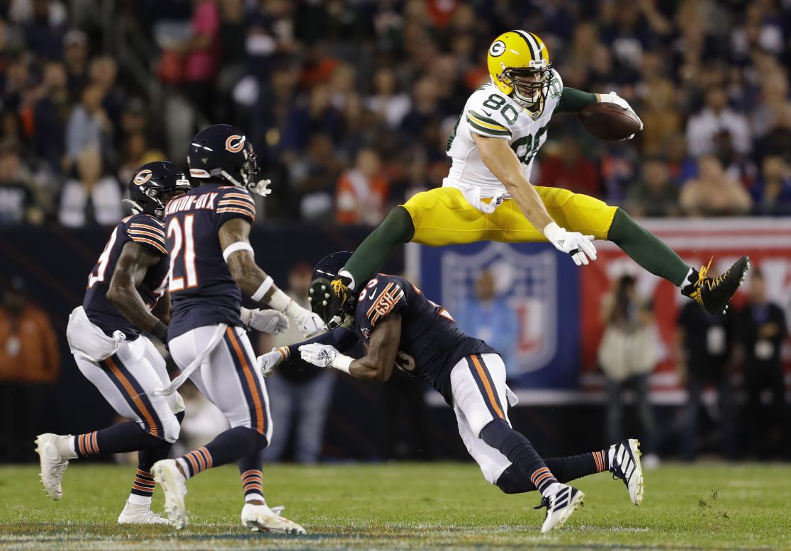 Green Bay Packers tight end Jimmy Graham hurdles Chicago Bears free safety Eddie Jackson in the second quarter of an NFL game at Soldier Field in Chicago, Illinois, on September 5.