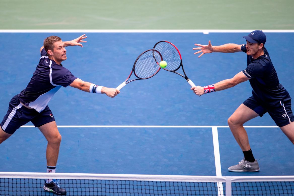 Jamie Murray and Neal Skupski of Great Britain compete against Juan Sebastian Cabal and Robert Farah of Colombia in the men's doubles demi-finals match during the US Open Tennis Tournament in Queens, New York, on September 5.