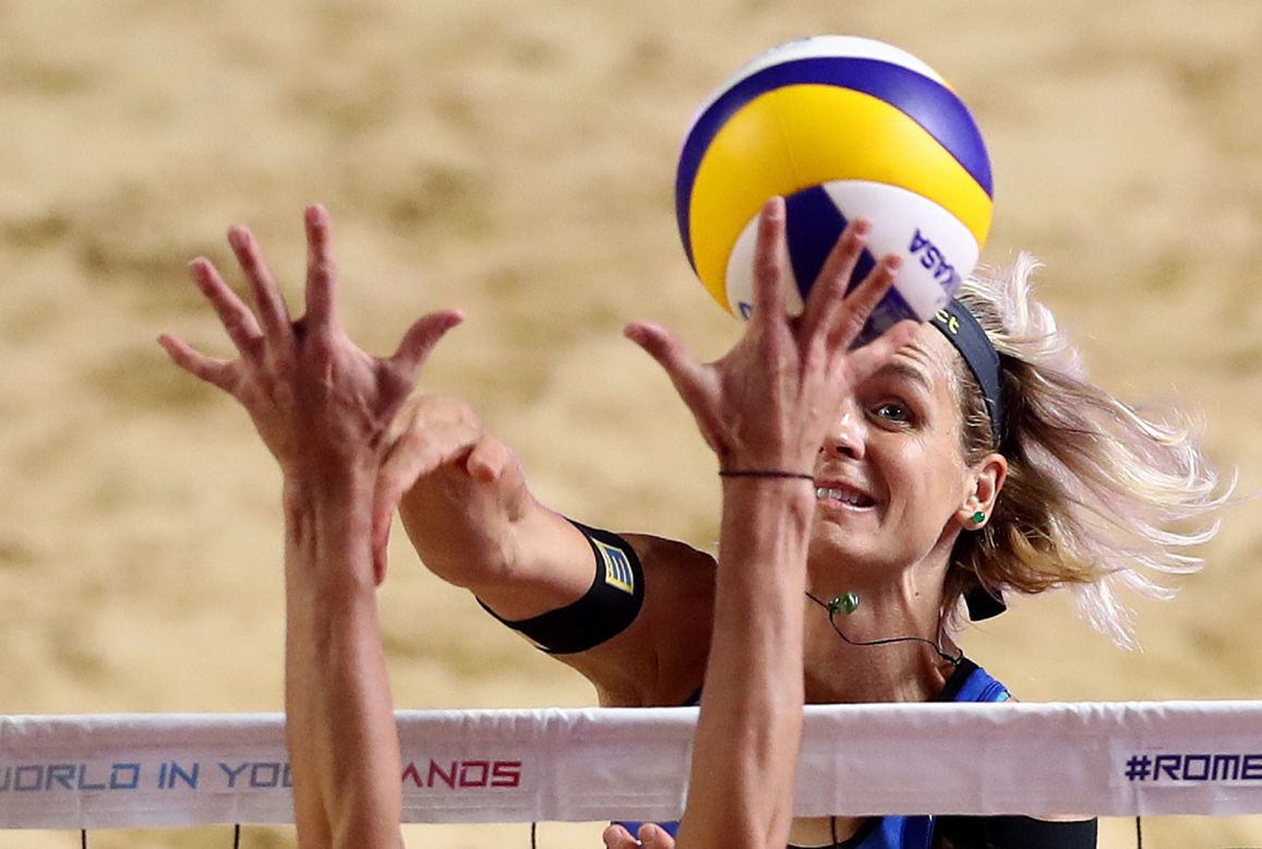 Germany's Laura Ludwig spikes the ball during the women's gold medal final at the Beach Volley World Tour Finals in Rome, Italy, on September 8.