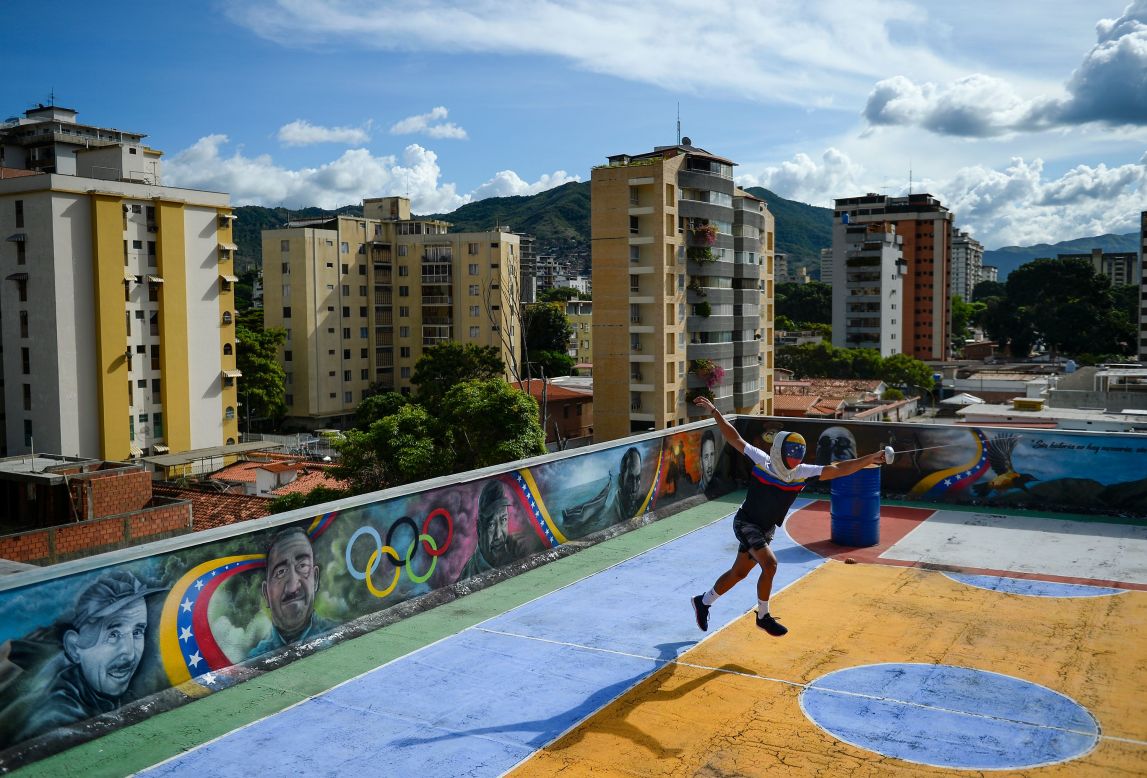 Venezuelan high-performance épée fencer Ruben Limardo trains on the roof of the Venezuelan Olympic Committee headquarters in Caracas on September 4.