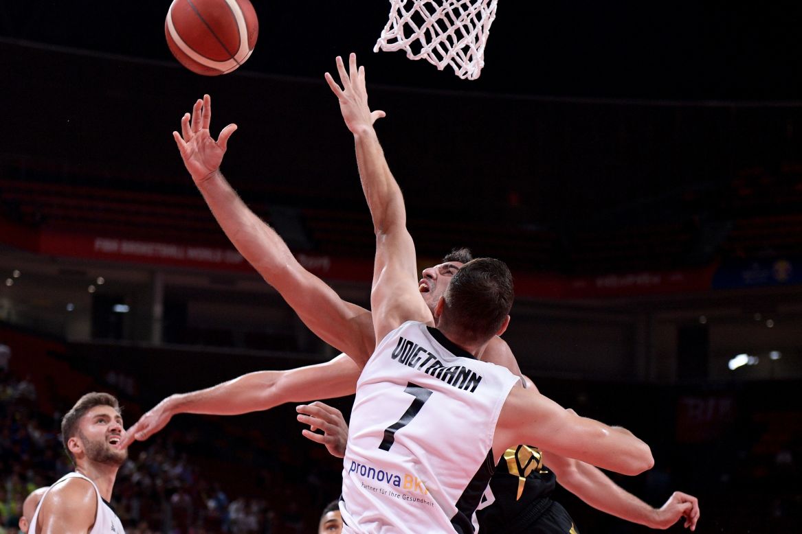 Jordan's Ahmad al Dwairi drives to the basket as Germany's Johannes Voigtmann tries to block him during the Basketball World Cup Group G game between Germany and Jordan in Shenzhen, China, on September 5. 