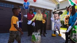 Jermaine Bell is surprised with a trip to Disney World after he spent his vacation money feeding Hurricane Dorian victims.