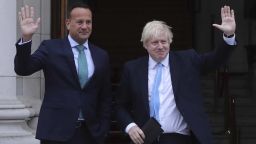 Britain's Prime Minister Boris Johnson, right, and Ireland's Prime Minister Leo Varadkar wave at Government Buildings in Dublin, Monday Sept. 9, 2019. Boris Johnson is to meet with Leo Varadkar in search of a compromise on the simmering Brexit crisis. (Niall Carson/PA via AP)