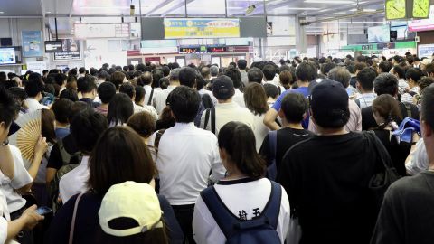 Commuters at a Japan Railways station, where trains were suspended due to Typhoon Faxai in Saitama on September 9, 2019.