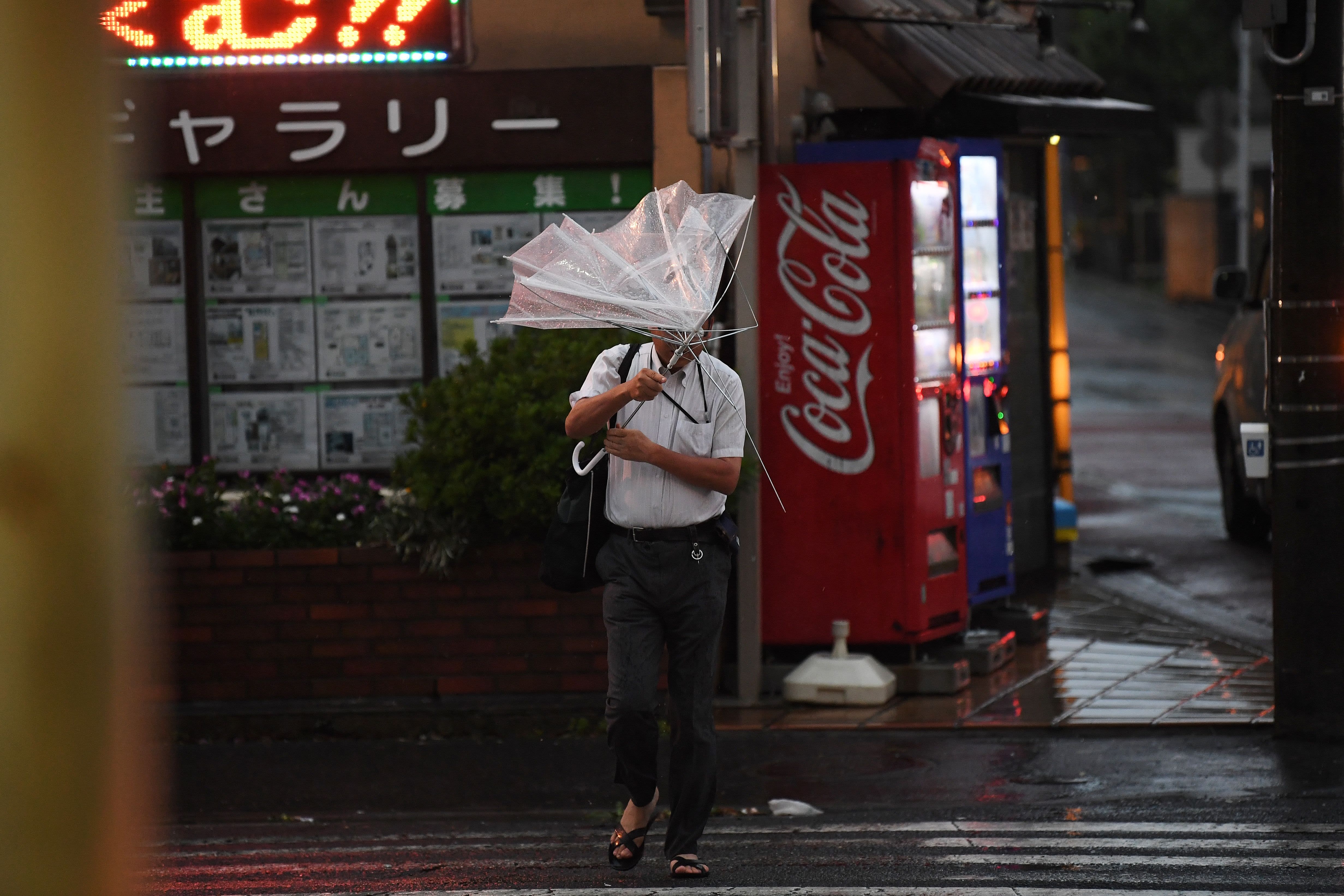 Japan typhoon leaves 100 flights canceled and 1 million