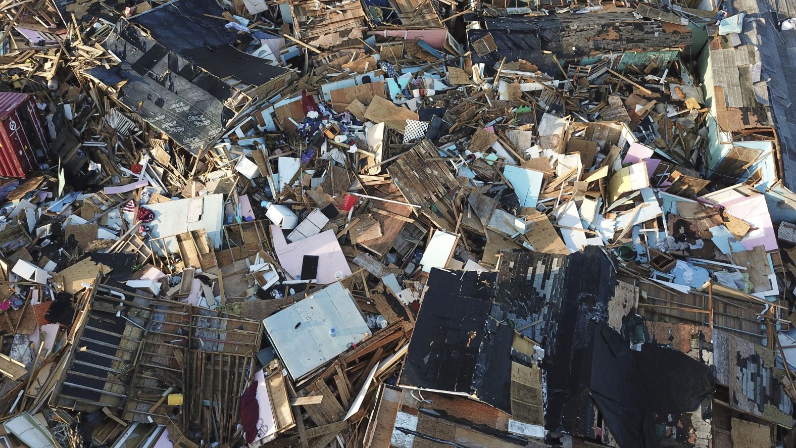 Homes are in ruins one week after Dorian hit Marsh Harbour.