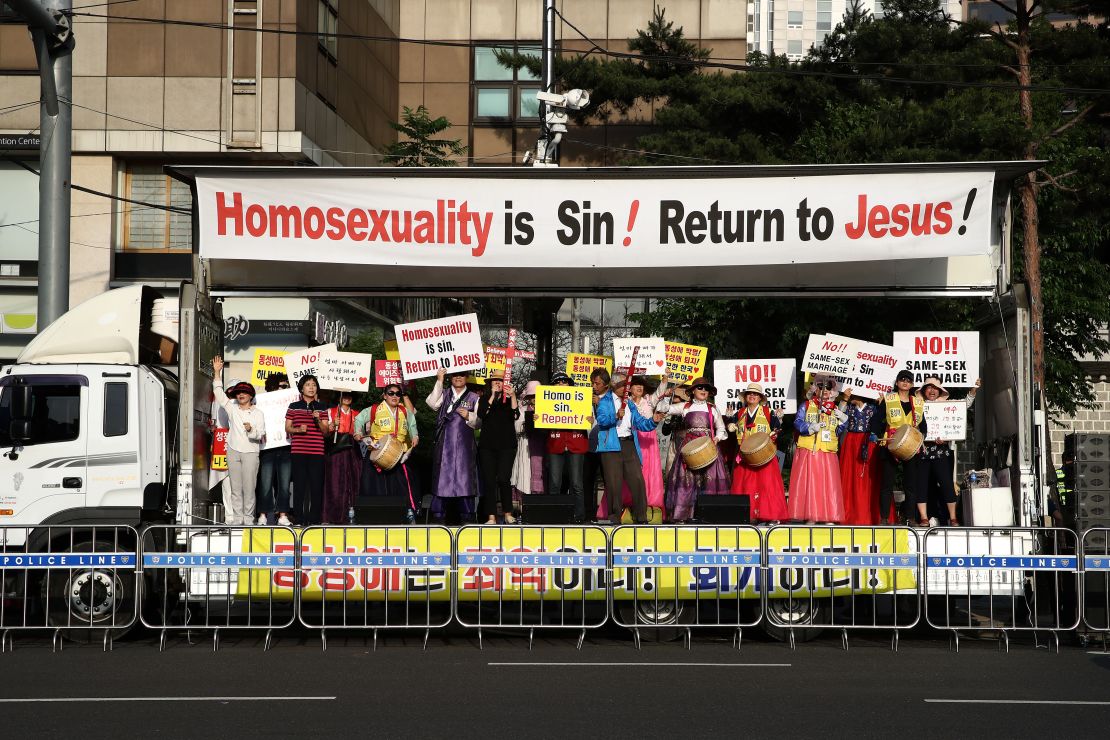 Anti same-sex marriage activists attend a rally next to the Seoul Queer Culture Festival in June 2019.