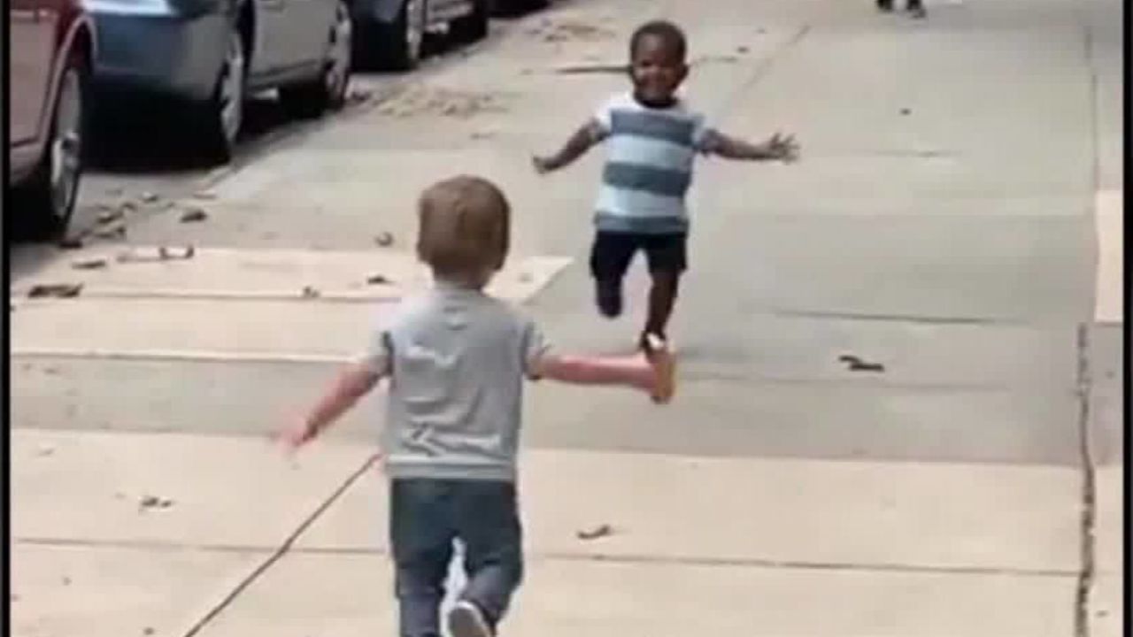 toddlers running hug each other new york dnt vpx_00000706.jpg