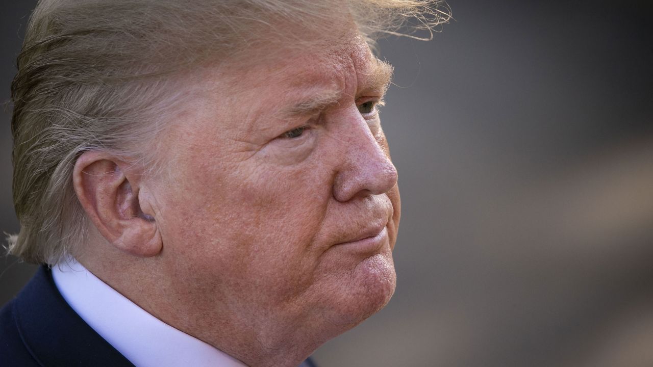 U.S. President Donald Trump listens to a question as he speaks to members of the media before boarding Marine One on the South Lawn of the White House in Washington, D.C., U.S., on Friday, August 30, 2019.