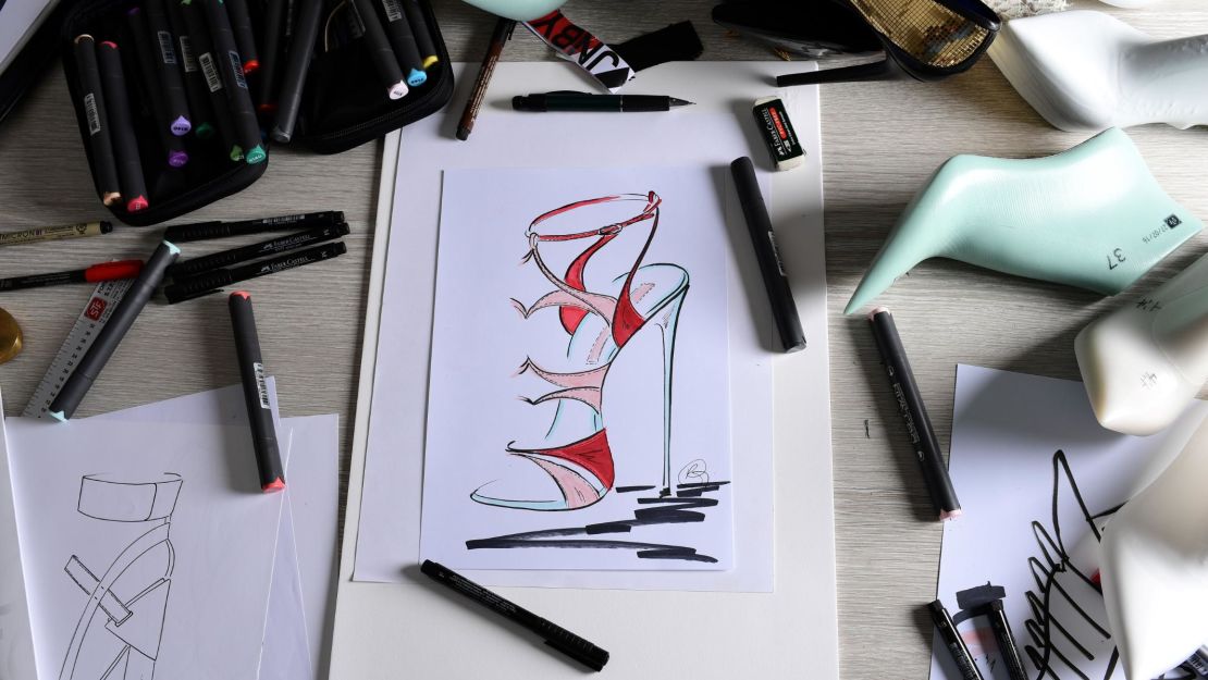 In addition to big-name designers, Milan is home to a number of independent ateliers, such as French shoe designer Raphael Young, who sketches his designs in his Milan studio.
