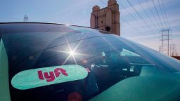 Lyft driver Alejandro Mendez rides his car in downtown Los Angeles, California, March 29, 2019. - Ride-hailing company Lyft made its Initial Public Offering (IPO) on the Nasdaq Stock Market on March 29th. (Photo by Apu Gomes / AFP)        (Photo credit should read APU GOMES/AFP/Getty Images)