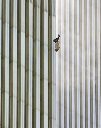 A man falls from one of the World Trade Center towers. The publication of this photo, taken by Richard Drew, led to a public outcry from people who found it insensitive. Drew sees it differently. <a href="index.php?page=&url=http%3A%2F%2Fwww.thedailybeast.com%2Farticles%2F2011%2F09%2F08%2Frichard-drew-s-the-falling-man-ap-photographer-on-his-iconic-9-11-photo.html" target="_blank" target="_blank">On the 10th anniversary of the attacks,</a> he said he considers the falling man an "unknown soldier" who he hopes "represents everyone who had that same fate that day." It's believed that upwards of 200 people fell or jumped to their deaths after the planes hit the towers.