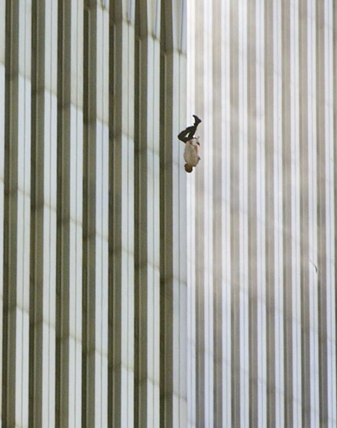 A man falls from one of the World Trade Center towers. The publication of this photo, taken by Richard Drew, led to a public outcry from people who found it insensitive. Drew sees it differently. <a href="http://www.thedailybeast.com/articles/2011/09/08/richard-drew-s-the-falling-man-ap-photographer-on-his-iconic-9-11-photo.html" target="_blank" target="_blank">On the 10th anniversary of the attacks,</a> he said he considers the falling man an "unknown soldier" who he hopes "represents everyone who had that same fate that day." It's believed that upwards of 200 people fell or jumped to their deaths after the planes hit the towers.