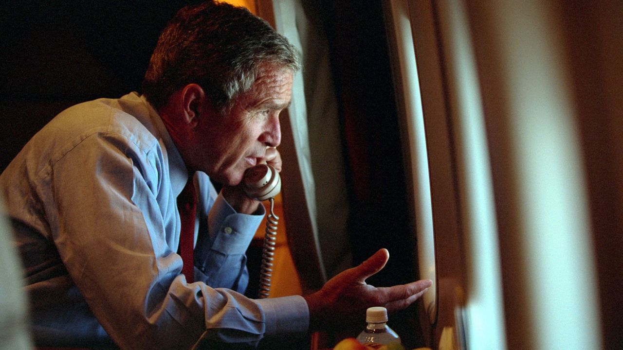 Bush speaks to Cheney aboard Air Force One after departing Offutt Air Force Base in Nebraska. He had flown to Nebraska temporarily for security reasons.