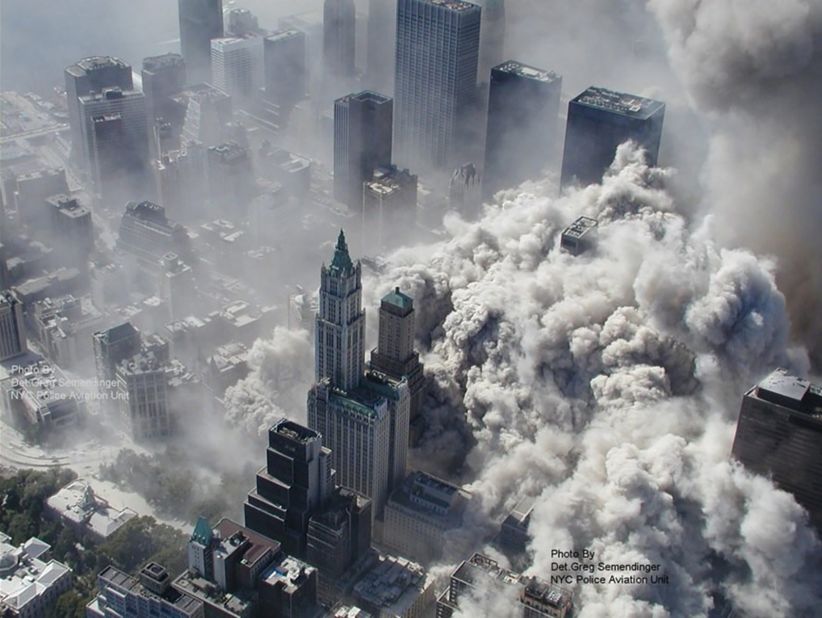 A massive cloud of smoke and debris fills lower Manhattan after the north tower crumbled.
