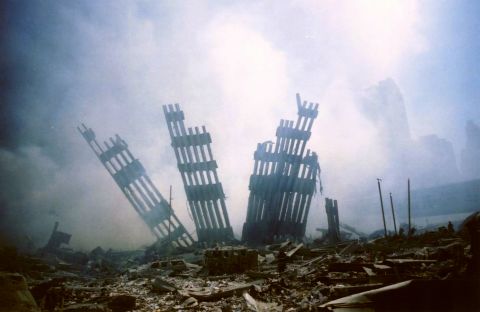 Remains of the World Trade Center are seen amid the debris.