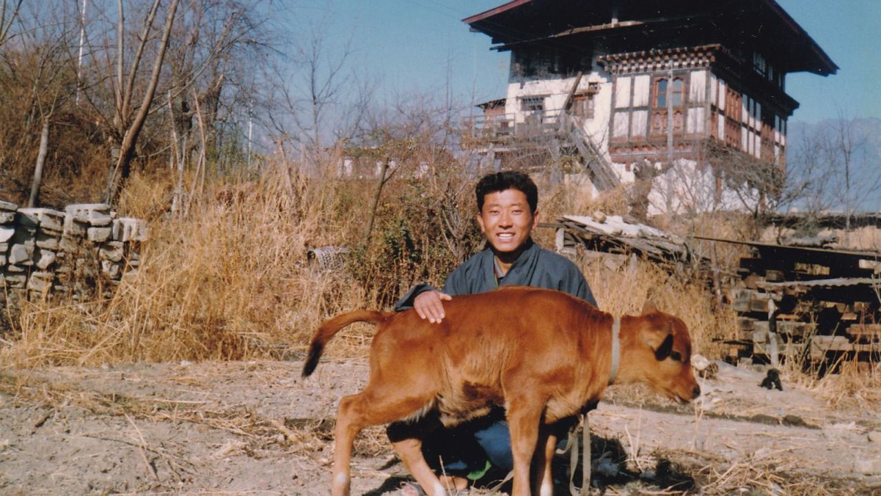 Bhutan's Prime Minister as a boy on his family farm.